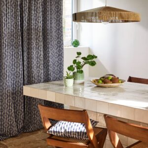 Castin natural and navy back tab curtain